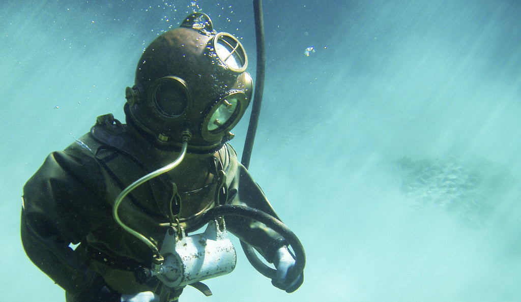 a scuba diver in full scuba gear underwater