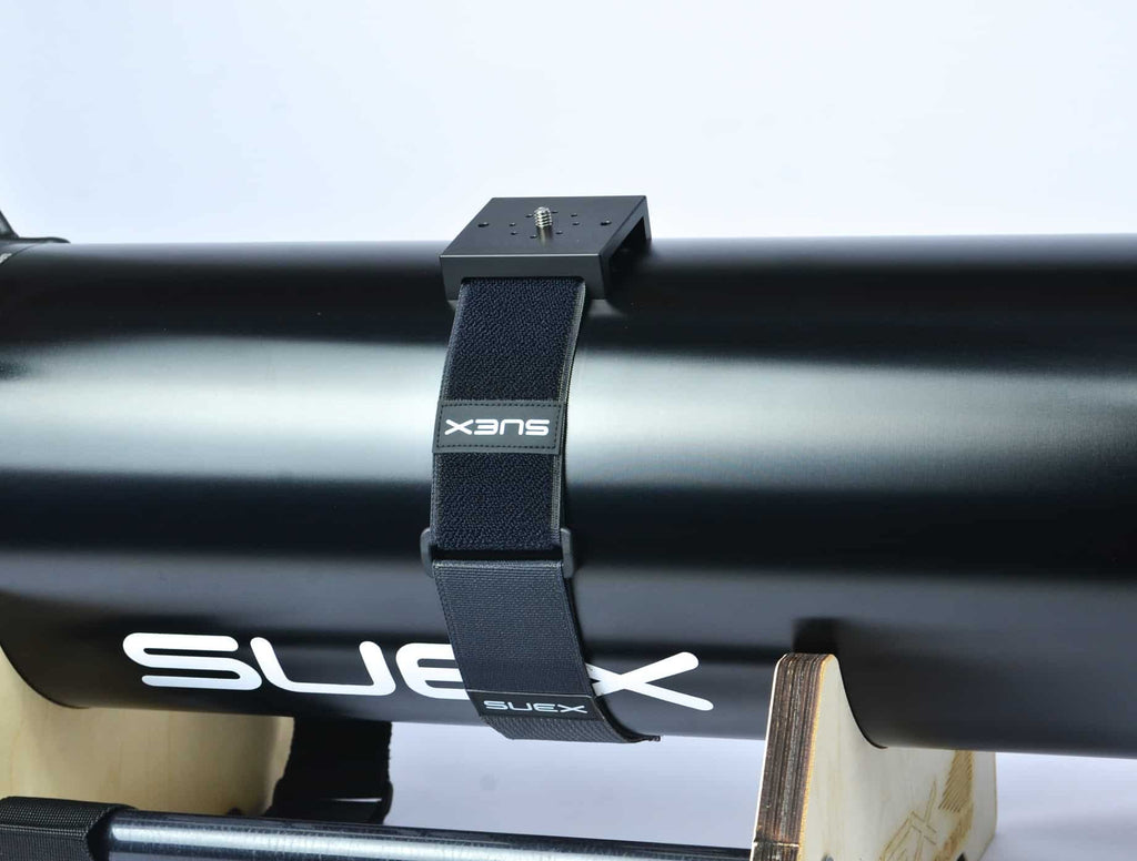 Black strap wrapped around a black tube.