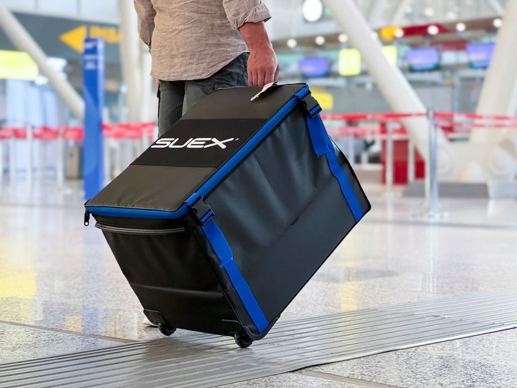 SUEX travel bag TG6ZPzog rolling through airport